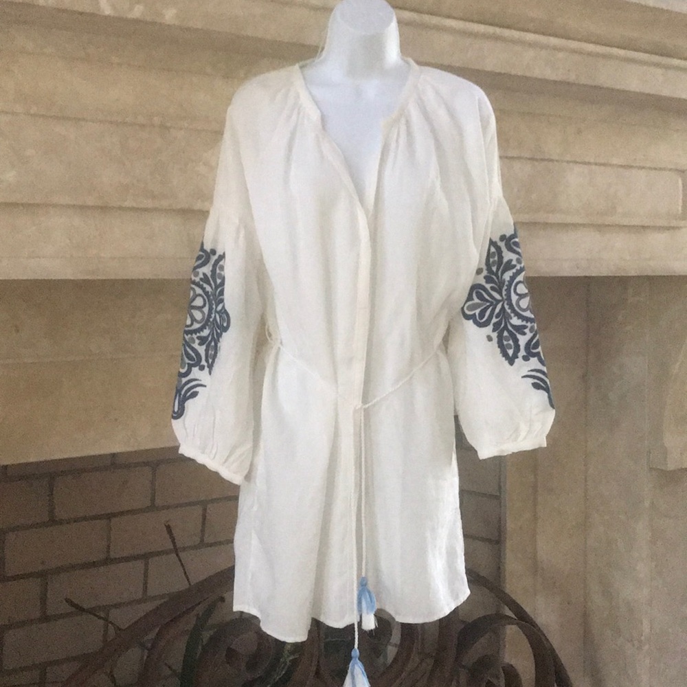 White summer dress with embroidered sleeves